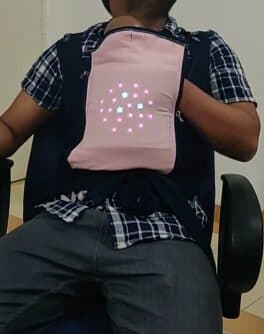 Early KangaGrow prototype, worn on the back during in-house testing
